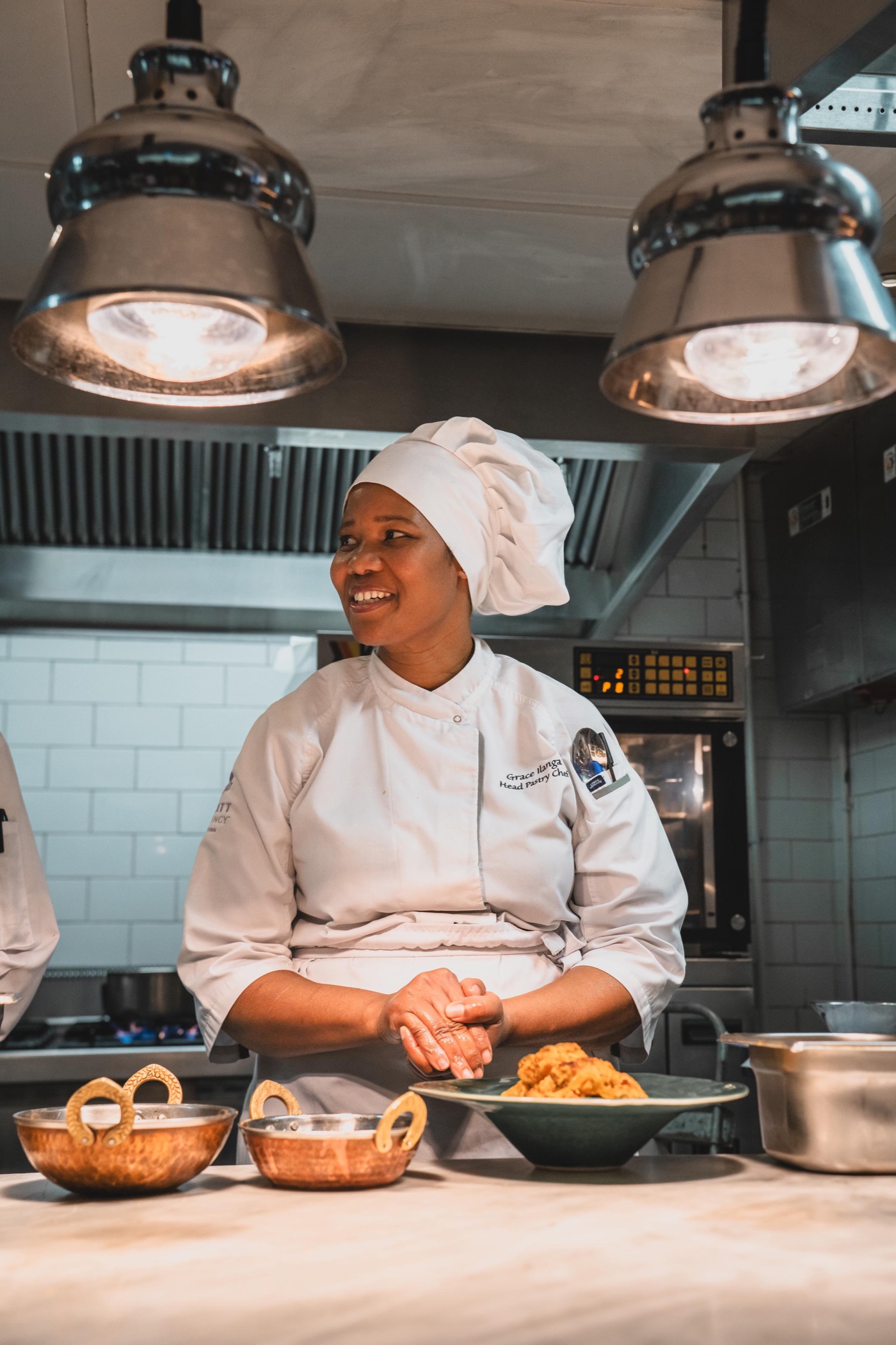 Chef Grace numa cozinha da África do Sul